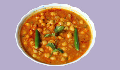 Spicy chana masala - white chickpea, Indian style famous vegetable curry food.