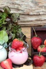 Fresh strawberries red and yogurt at delicious.