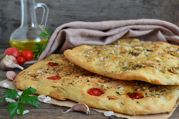 Focaccia with cherry tomatoes and provencal herbs