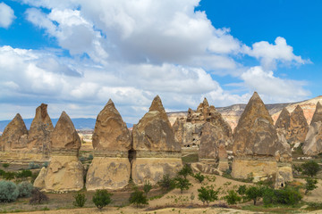 Fototapeta na wymiar Stone formations fairy chimneys in Cappadocia, Turkey.