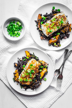 Grilled fish with black rice