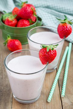 Healthy smoothie with strawberry, banana and yogurt in glass