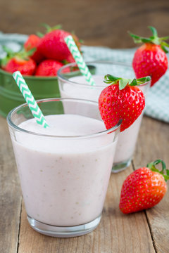 Healthy smoothie with strawberry, banana and yogurt in glass