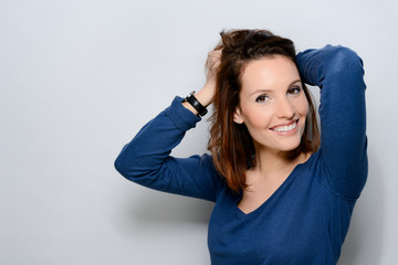 Naklejka premium fashion studio portrait of a pretty young woman in winter outfit