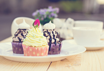 Chocolate Cupcake with chocolate frosting on the table