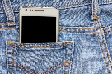 White phone in jeans pocket
