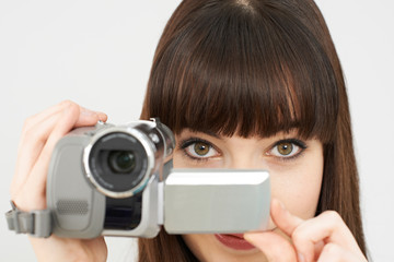 Woman Recording On Portable Video Camera