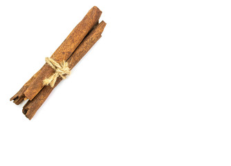 Bunch of cinnamon sticks on white background