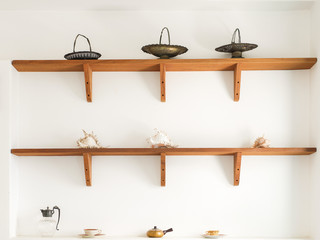 wooden shelve with shells and vintage decoration