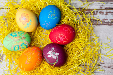 Easter eggs on rustic wooden background