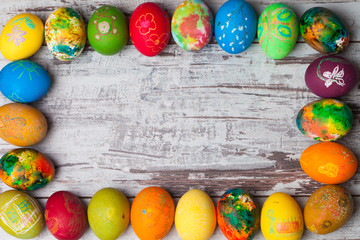 Easter eggs on rustic wooden background
