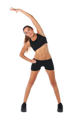 Fototapeta na wymiar Happy young woman holding doing exercise and stretching over white