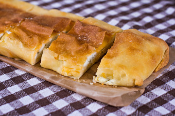 2 cups of coffee, a blanket, cake and heart