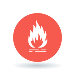 Fire icon. Flammable sign. Flame symbol. White fire icon on red circle background. Vector illustration.
