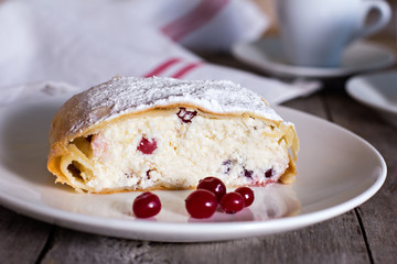 Strudel or pie with cheese and cranberries