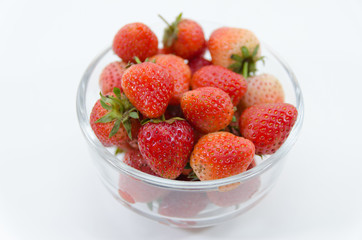 Juicy, fresh strawberries in a bowl