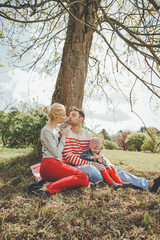 Cheerful couple and child