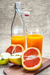 Juice of apples and red grapefruit.