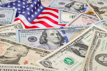 American flag and dollar bills
