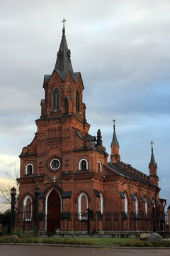 red brick ancient catholic cathedral in gothic style in Vladimir