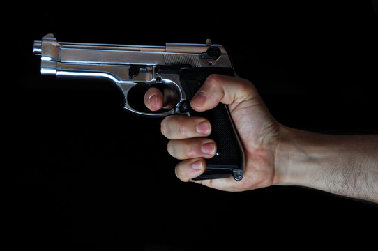 Holding a handgun