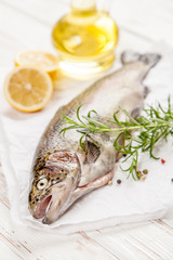 Fresh trout on white wood