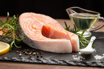 Fresh salmon on old wood