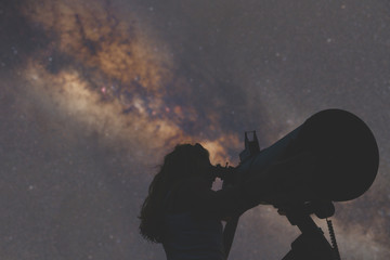Stargazing through a telescope. 