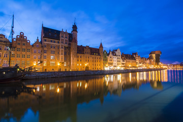 Fototapeta na wymiar Night view of Old Town and Motlawa river in Gdansk, Danzig