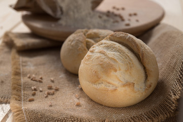 Fototapeta na wymiar white bread and flour on the table