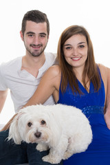 Portrait of happy couple isolated on white background. Attractive man and woman being playful.