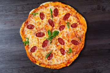 Pepperoni Pizza with Basil leaves