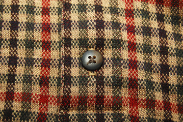 Close up of a button on a shirt