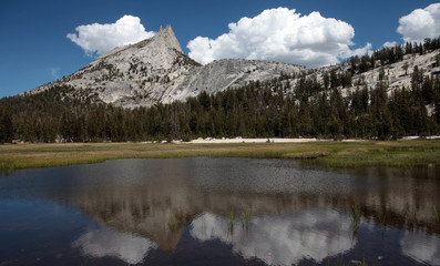 Cathedral Peak is one of many granite peaks carved by glacial activity in Yosemite National Park.