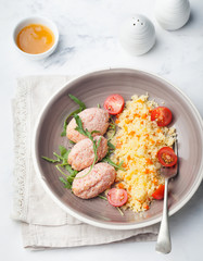 Crab and prawn, fish steamed meatballs, patties with couscous on white background Top view