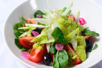 salad of tomatoes and greens