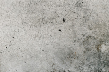 Closeup fragment of crack grunge concrete backgound for design.