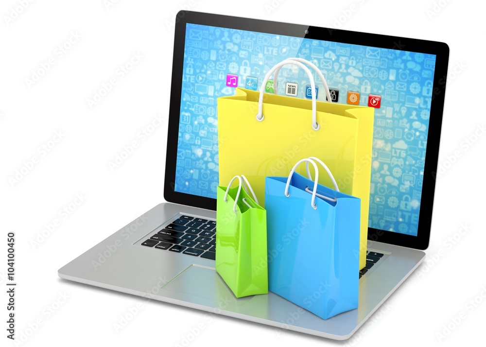 Wall mural laptop and  shopping pags on white background