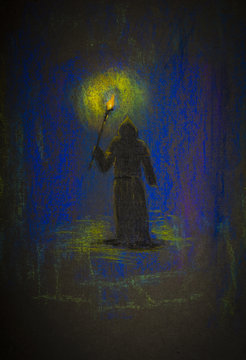 monk with a torch in the dark