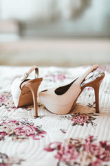 Beautiful bride's white shoes