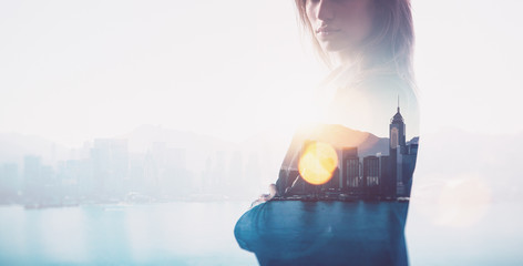 Closeup of businesswoman. Double exposure, city and bay on the background. Blurred background,...