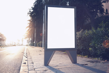 Photo empty lightbox on the bus stop. Horizontal mockup, sunlight