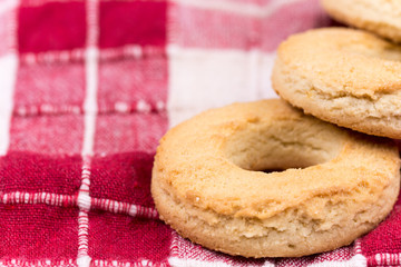 Macro view of round tea cookies on the tablecloth