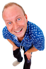 Emotional happyÂƒ smiling man with white teeth and wide eyes looking straight at camera isolated...
