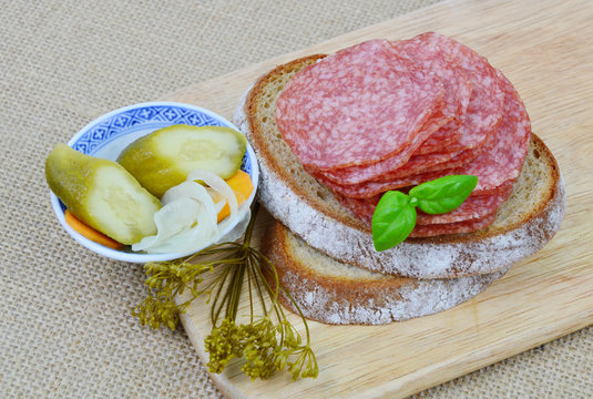 easy menu. (Soft focus, lens blur).
salami, bread and pickle cucumbers