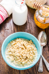Healthy breakfast, porridge in bowl.