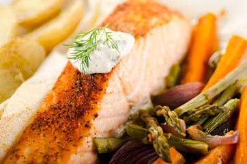 roasted salmon with vegetables and sauce