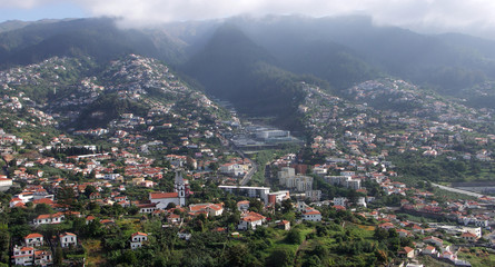 Obraz premium Cityscape of Funchal Madeira Houses on the mountain side.