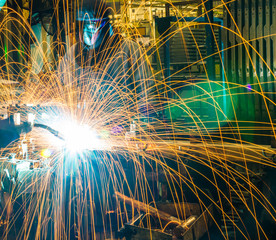 welding worker in the automotive part in Industrial