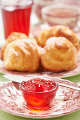 Quince-cranberry jelly in little glass bowl for breakfast